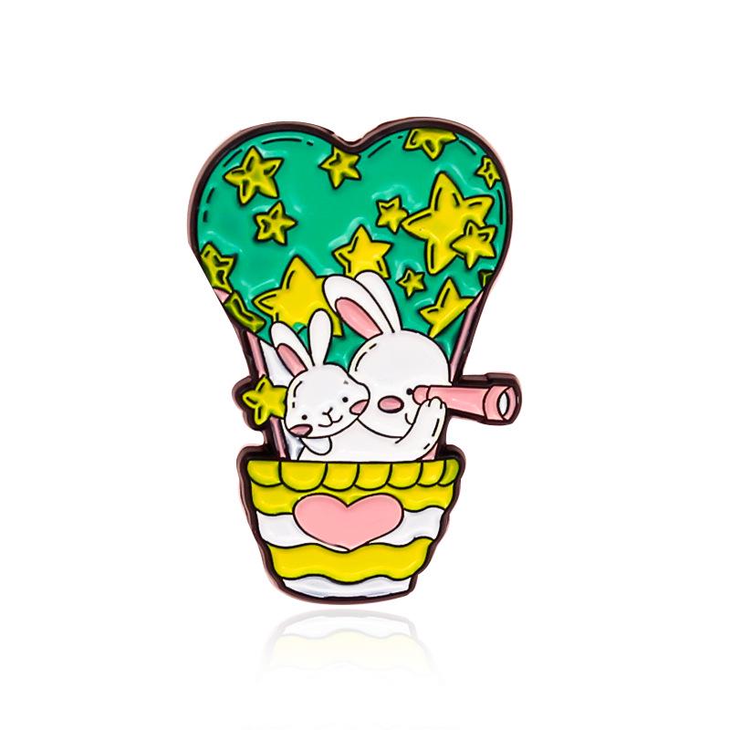 Heart Balloon Rabbit Brooch: A whimsical cartoon design featuring a rabbit with a telescope.