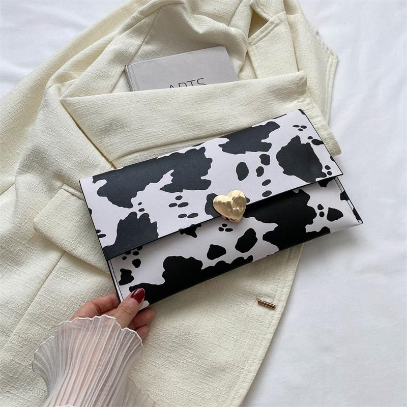

Trendy Pu Envelope Clutch Handbag For Ladies With Magnetic Closure In Chic Milk Zebra And Leopard Designs