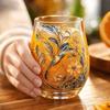 Handcrafted Glass Tumbler with Intricate Floral and Bird Design Embellished with Gold Accents Suitable for Decorative and Everyday Use