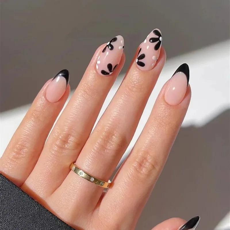 

24Pcs Short Almond Press On Nails, Nude with Black French Tips & Black Flower Fake Nails for Minimalist Style United States