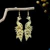 Peacock Tassel Earrings with Hollow Leaf Design in Retro Ethnic Style Imitation Silver for Women