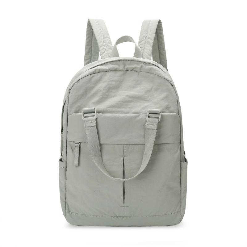 

Мужской однотонный рюкзак Женский большой вместимости Легкий рюкзак Студенческая дорожная сумка светло-зеленый