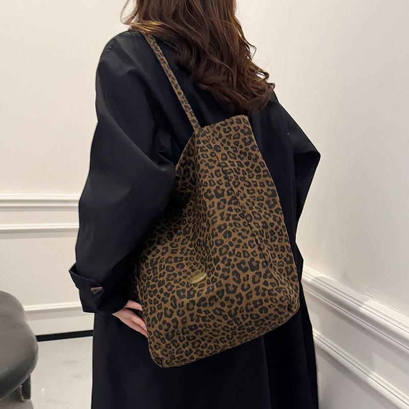 Mote leopardtrykk lerretsveske dame 2025 ny trend mote college-stil tote bag avslappet retro skulderveske