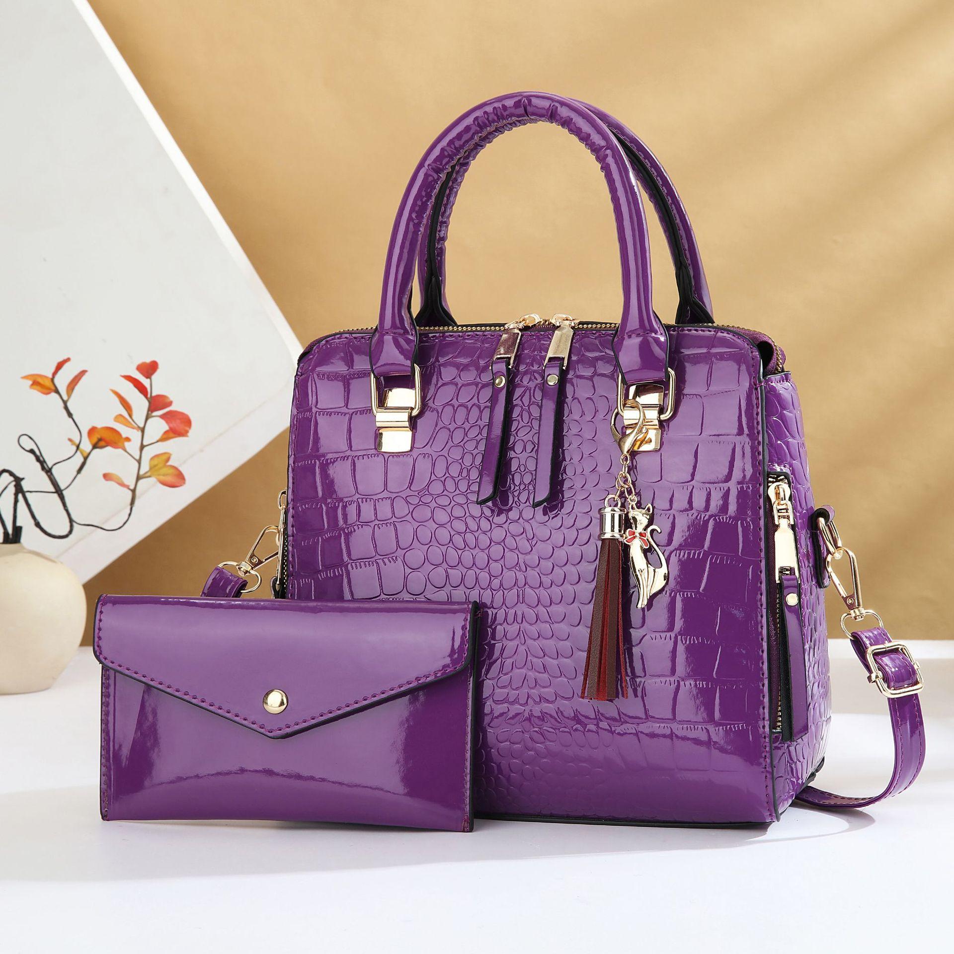 

Taizhou women s bag fashion crocodile pattern mother and child bag large capacity explosion women s bag fringed pendant portable messenger bag фиолетовый