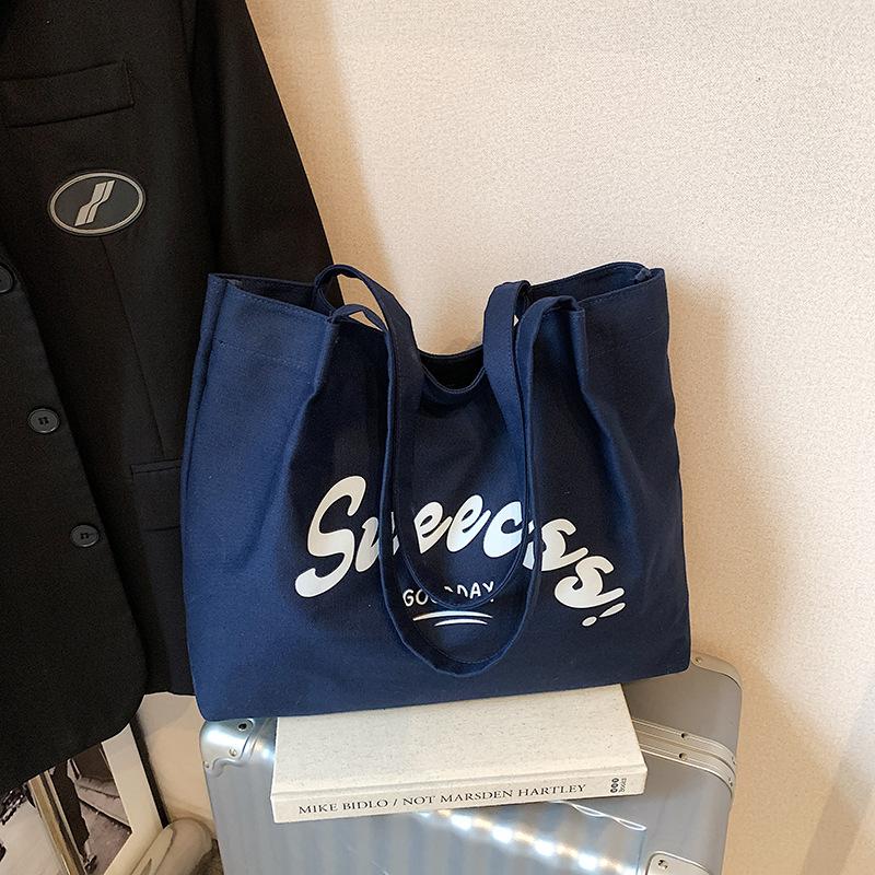 

Large capacity lightweight cloth bag women s new fresh and versatile shoulder bag casual class commuter tote bag темно-синий