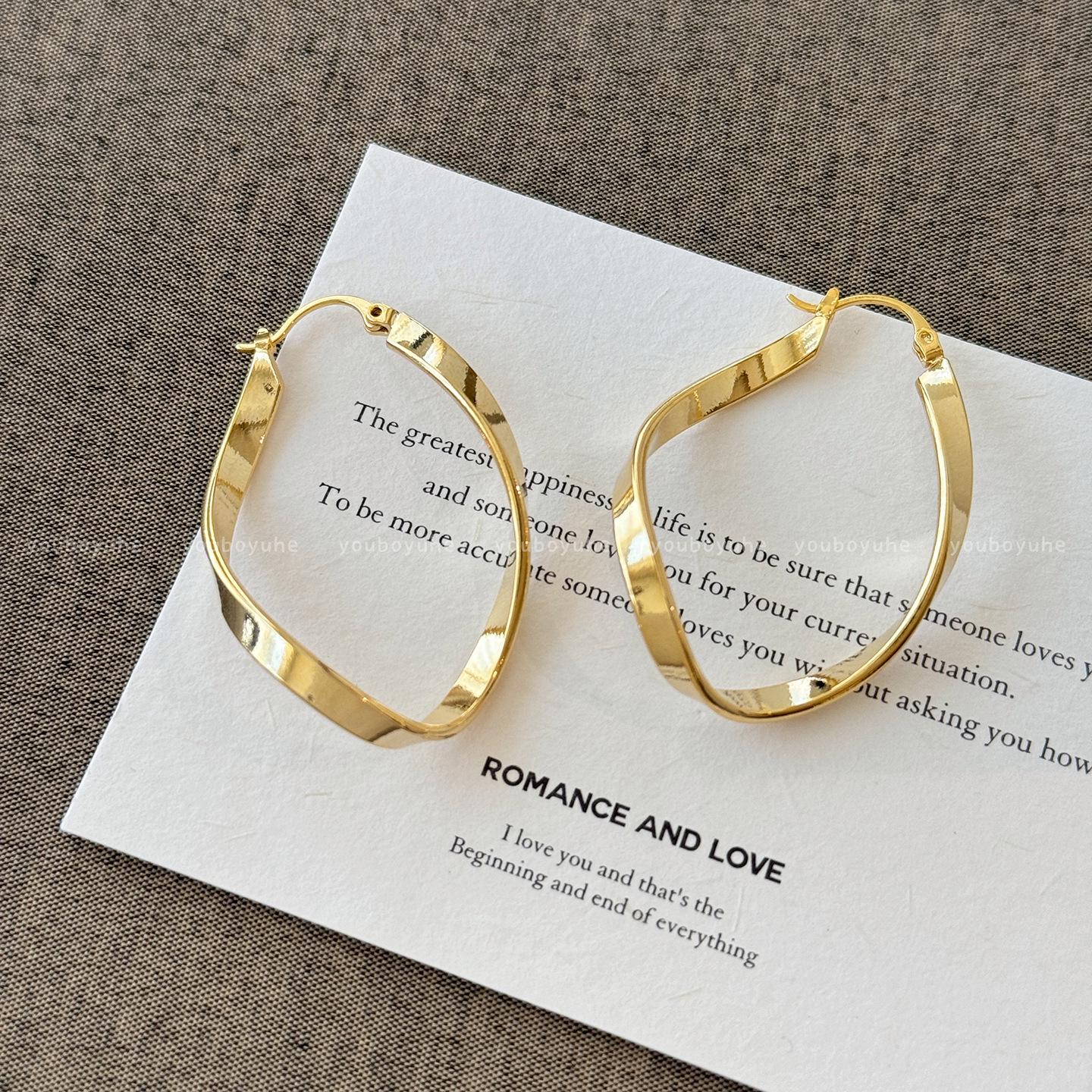 

2025 New Gold Plated French Möbius Hoop Earrings for Women - Light Luxury, High-End Jewelry for Square & Round Faces