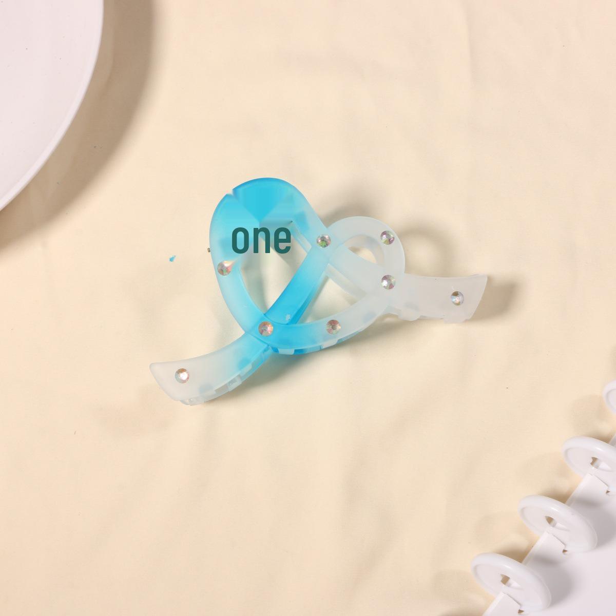 

High-End French Bow Claw Clip: Versatile Girlish Shark Clip, Hollowed-Out Hair Accessory