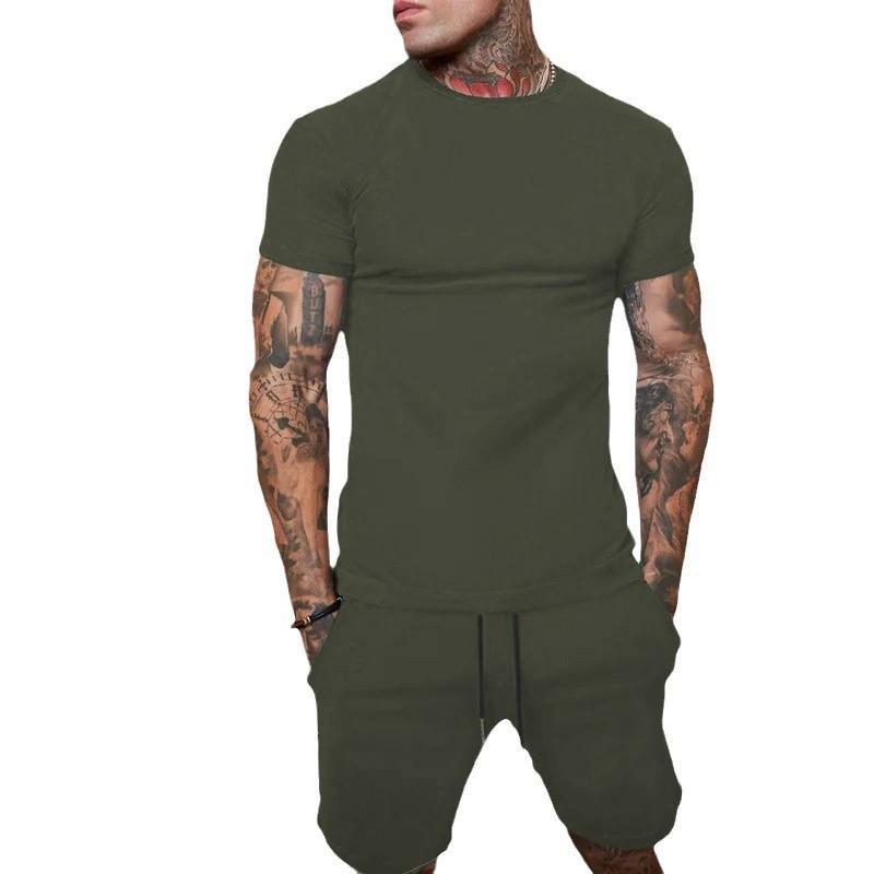 Conjunto de Camiseta de Manga Corta y Pantalones Cortos de Color Sólido para Hombre de Verano - Transpirable y Elegante.