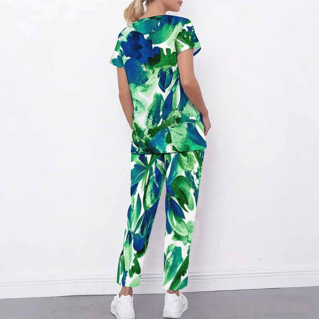 Women Plus Size Tropical Leaf Print Scrub Set Cutout Neck Short Sleeve Top With Pockets Long Pants