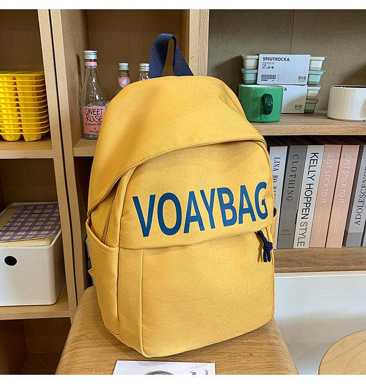 

New small fresh middle school student backpack female college high school student large capacity niche schoolbag fashion