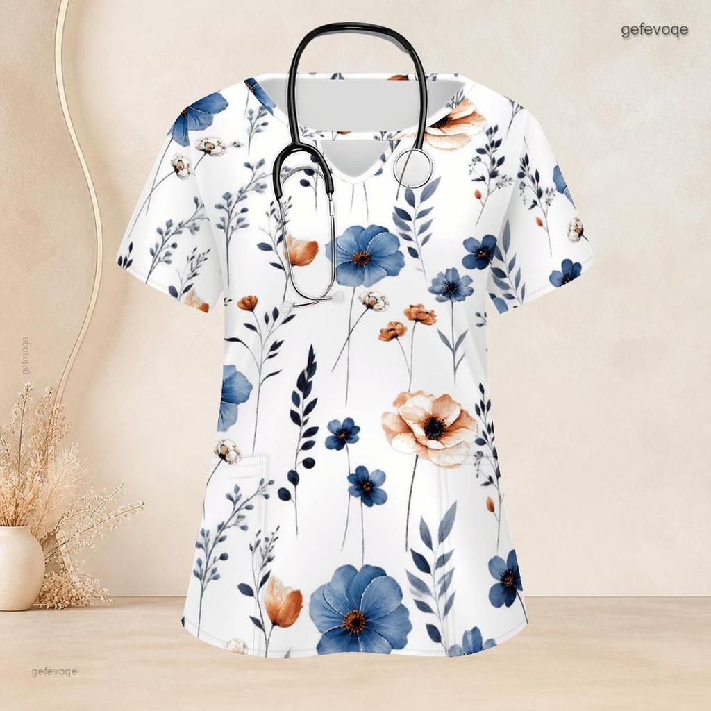 Top de uniforme rosa floral para mujer de talla grande, cuello con ojo de cerradura, manga corta, con bolsillos delanteros