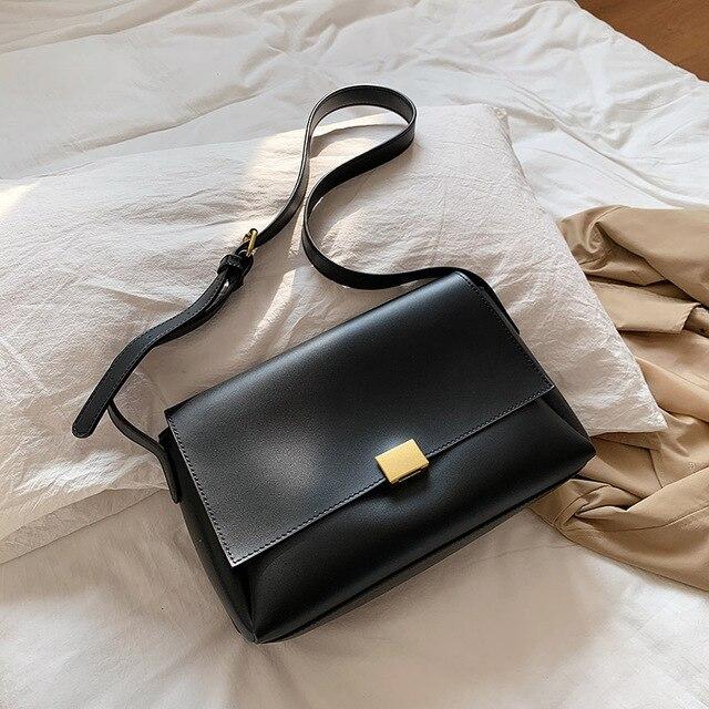 the trend black leather purse