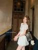 2026 Summer French Slim-fit Peter Pan Collar White Shirt and Embroidered Heart Skirt Set for Women