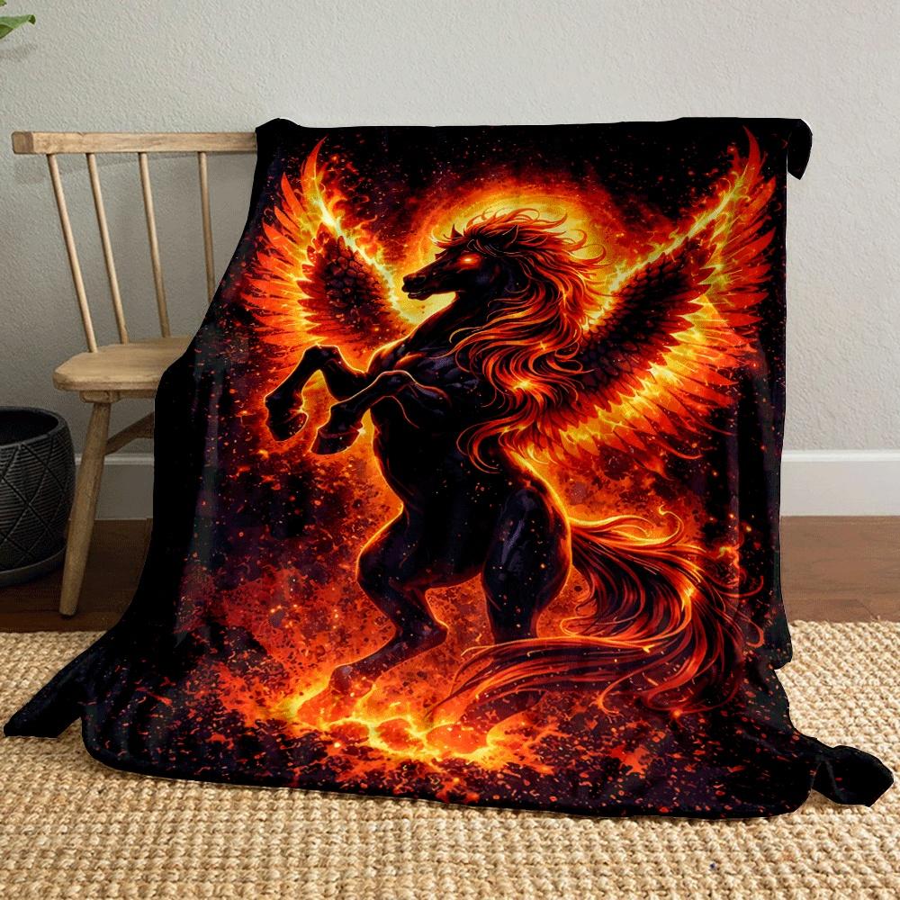 A fiery black-winged horse surrounded by flames and glowing embers. for all seasons blanket lunch break throw gift