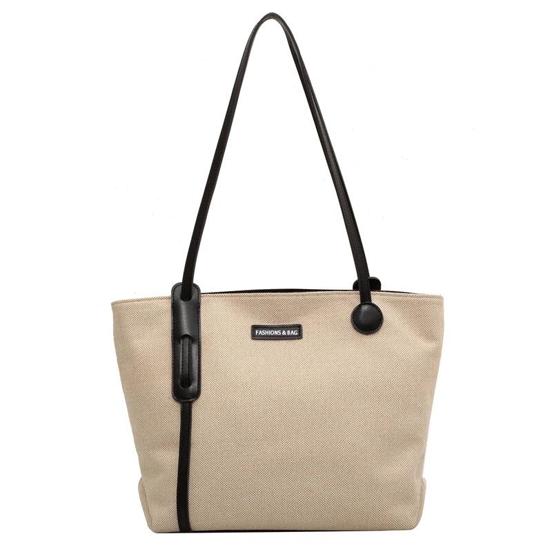 Casual large-capacity bag women's bag 2025 spring/summer new versatile canvas bag commuter shoulder bag simple tote bag
