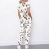 Women Plus Size White Floral Printed Scrub Set Cutout Neck Short Sleeve Pocket Top Long Pants