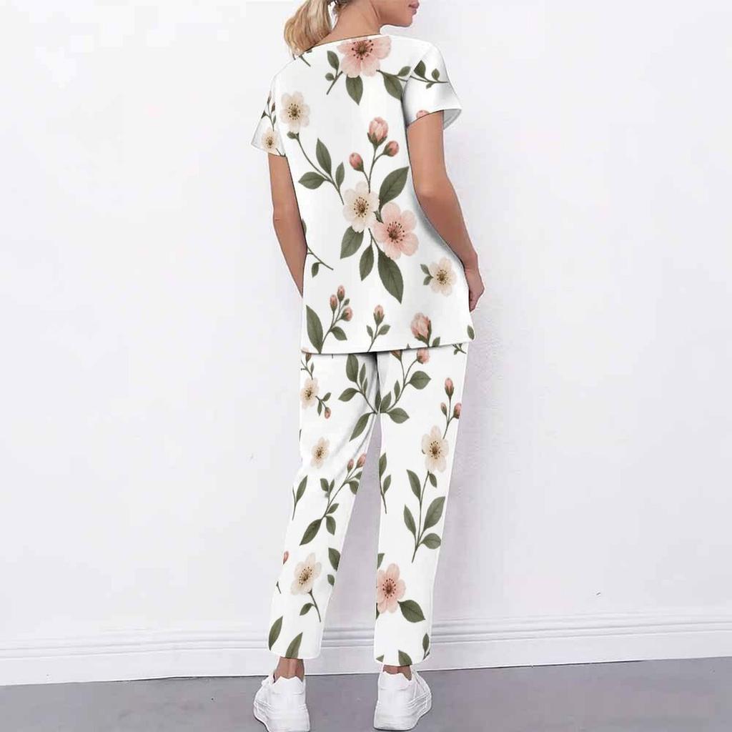 Women Plus Size White Floral Printed Scrub Set Cutout Neck Short Sleeve Pocket Top Long Pants