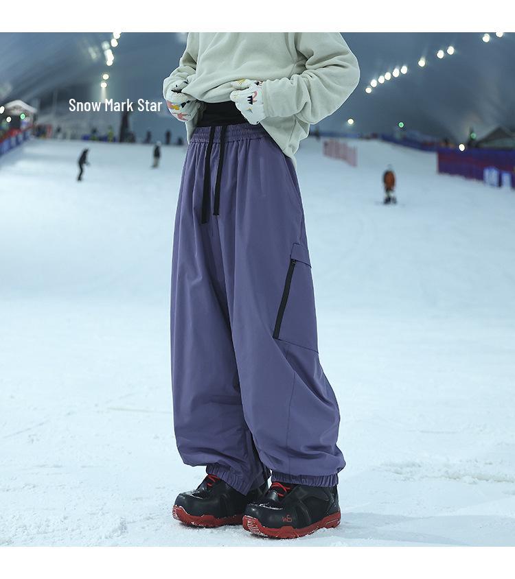 Unisex Waterproof & Windproof Ski Pants for Extreme Cold, Ideal for Northeast China Winters, Mountaineering, and Snowboarding.