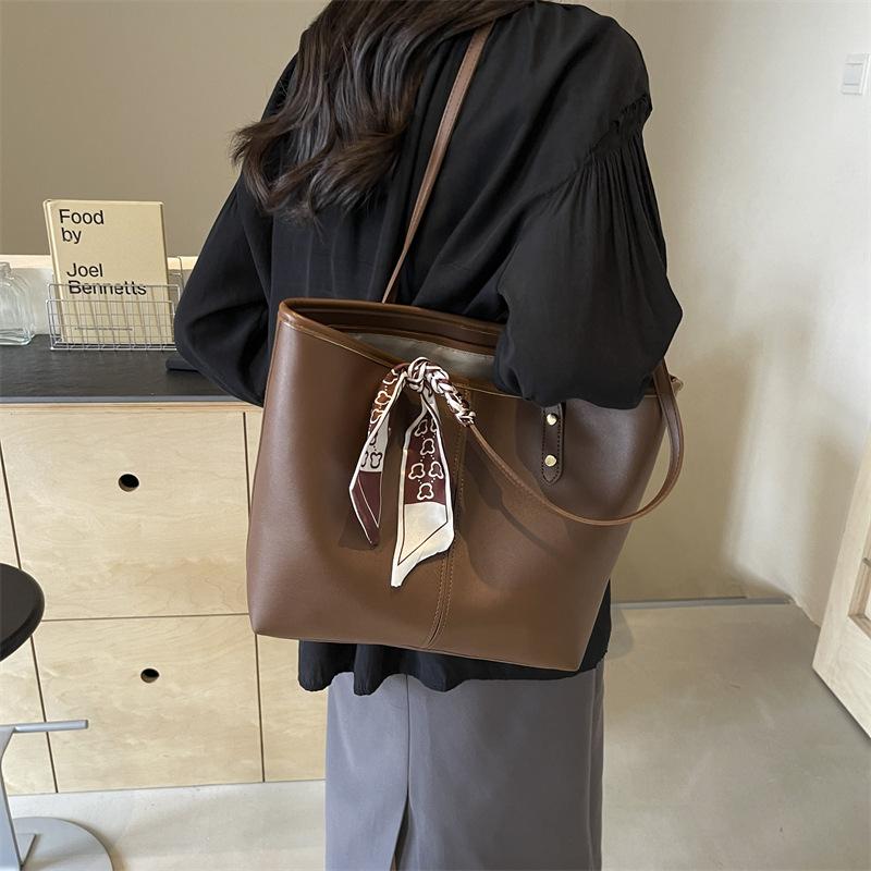 Mode Damen Tragetasche mit großem Fassungsvermögen Neue vielseitige Umhängetasche Freizeittasche