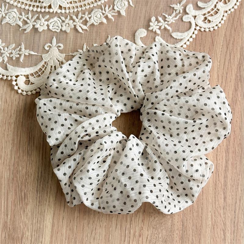 

Lightweight Polka-Dot Sheer Scrunchies Offer Delicate Retro Charm With Breathable Mesh Material For Comfortable Styling Off-White Dot Scrunchie
