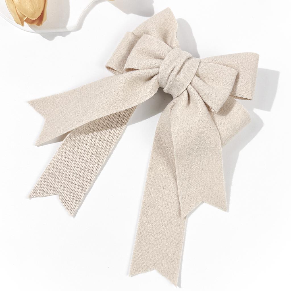 A Solid Woolen Bow Hair Clip for Autumn and Winter, a Fashionable, Simple and High-end Hair Accessory for Women