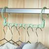 1pc Foldable Rotating Magic Plastic Hanger Saves Space Wardrobe Hanger Windproof Hanger Multi Hole Durable (Color Random)