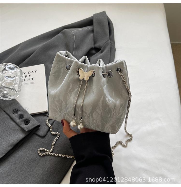 

Модная сумка-ведро с кольцом, портативная, 2025, новый нишевый дизайн, сумка-мессенджер на цепочке, популярная дорожная сумка через плечо