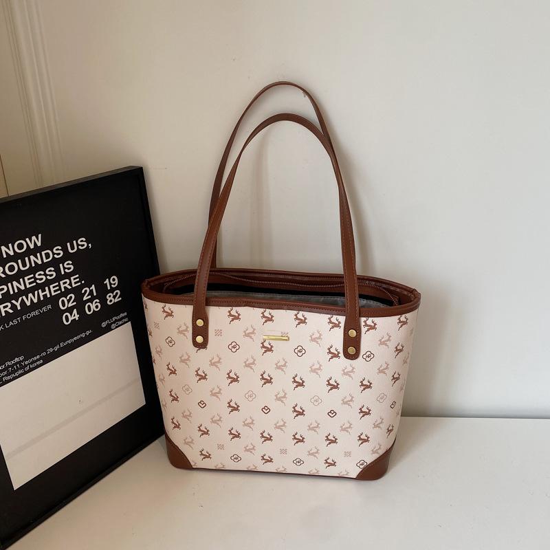 

Cute cartoon embossed tote bag 2025 new girl heart foreign large capacity commuter student shoulder handbag