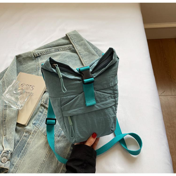 Japan and Korea casual small satchel women's 2025 new lightweight canvas mobile phone collar wallet niche design shoulder messenger bag