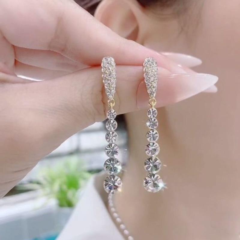 Boucles d'oreilles à longues pampilles pour femmes, style coréen Dongdaemun, design original, boucles d'oreilles polyvalentes