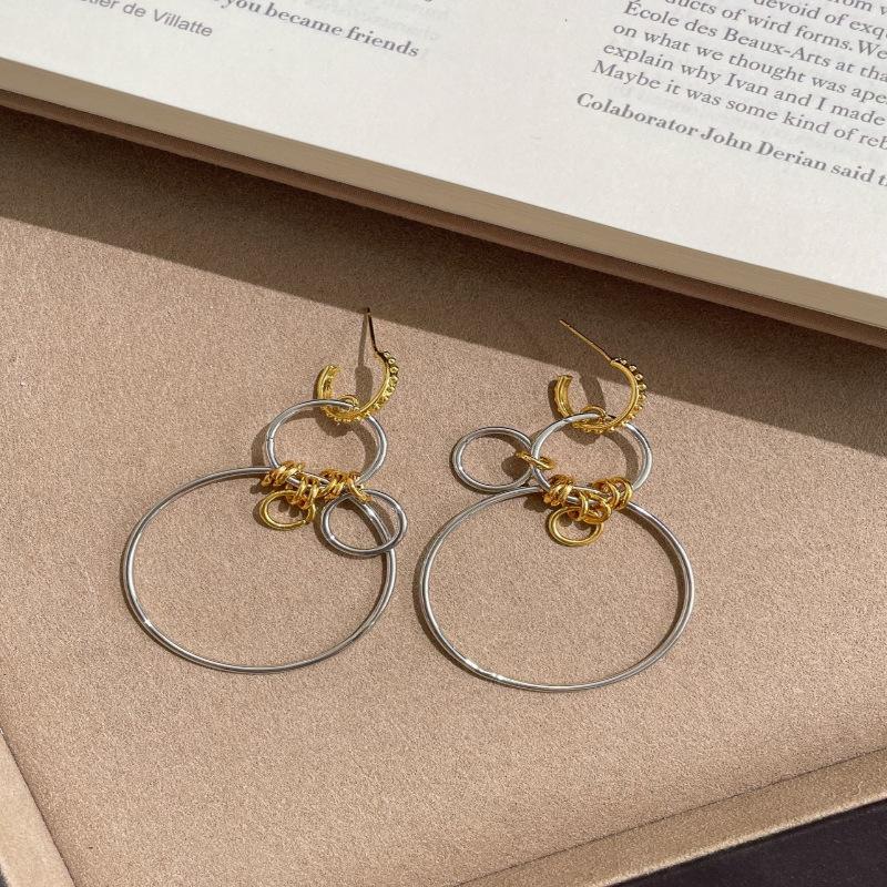 

Silver Needle Hollow Round Pendant Earrings European and American Simple Fashion Temperament Versatile Earrings Light Luxury Advanced Earrings Women