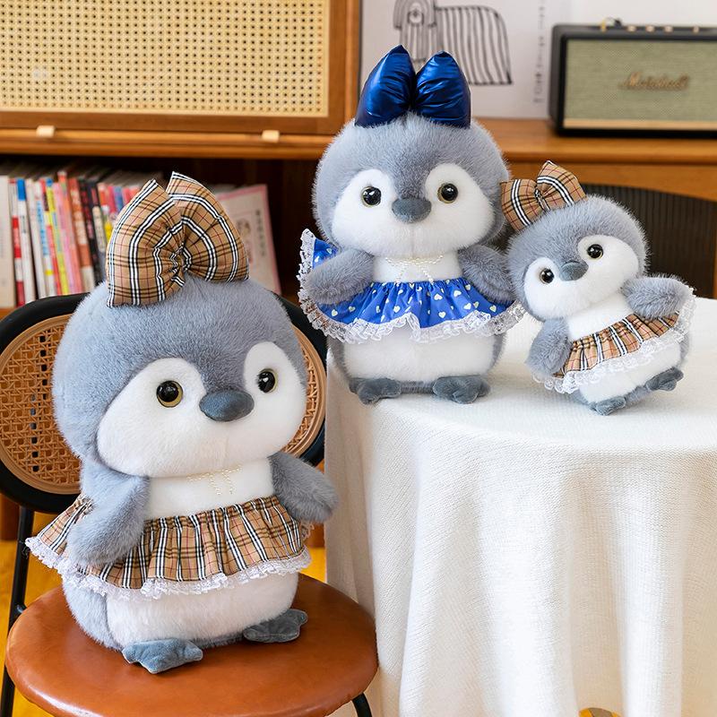 Neuer niedlicher Schleifenrock Pinguin Plüschtier Puppe Aquarium Souvenir Kinder Geburtstagsgeschenk