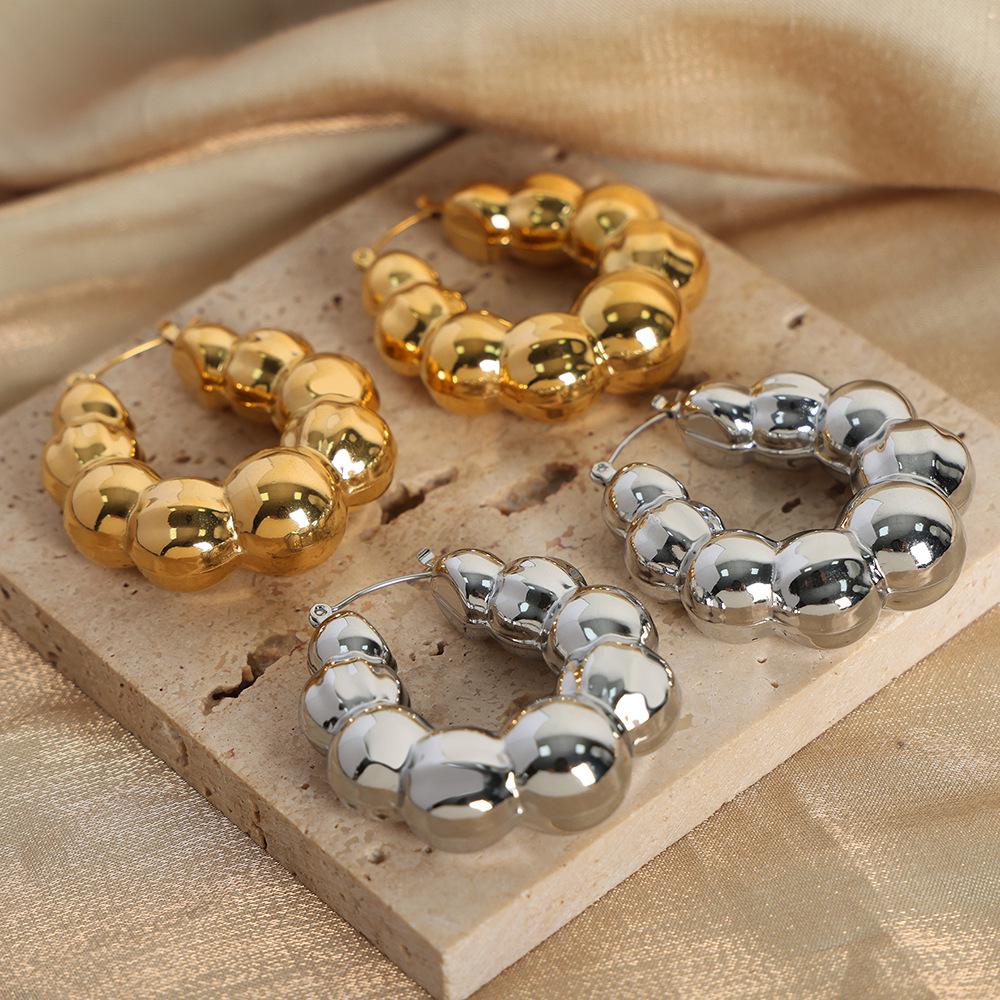 Textured Gold-Plated Titanium Steel U-Shaped Earrings with Steel Ball Design