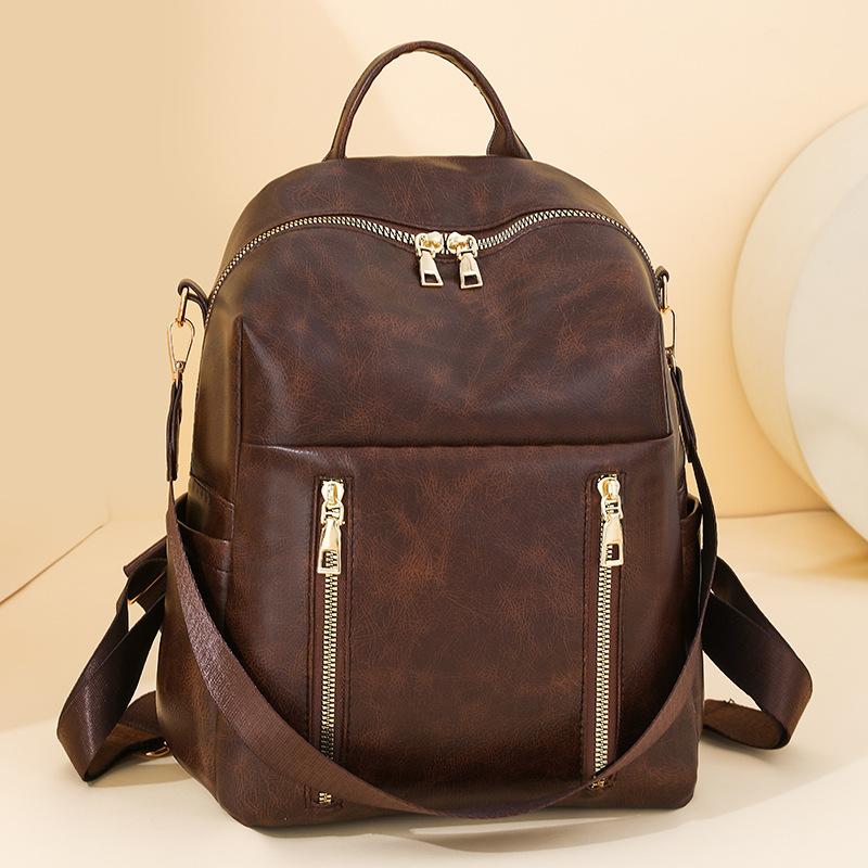 Simple Backpack Women's New Trend Fashion Pu Soft Leather Backpack Large Capacity Commuter Travel Bag