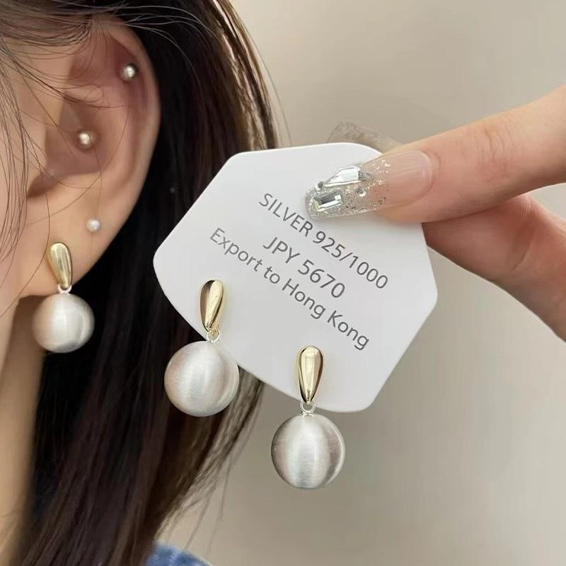 Metal matte brushed ball stud earrings women s cold wind advanced sense contrasting earrings retro light luxury versatile earrings