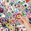 52-Piece Horror Eyeball Graffiti Cartoon Sticker Set: PVC Waterproof Decals for Phone Cases, Suitcases, and Stationery.