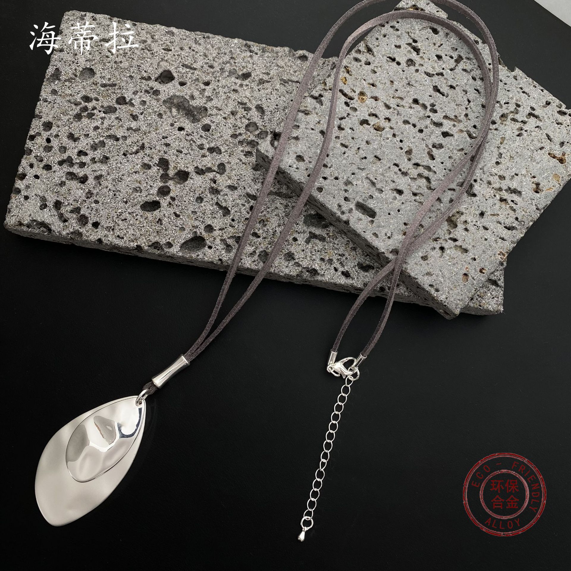 

Irregular leaf alloy pendant, simple retro leather rope women s long high-end necklace