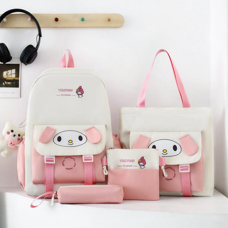 School bag new cartoon cute primary school schoolbag four-piece large-capacity middle school student backpack burden reduction casual backpack women