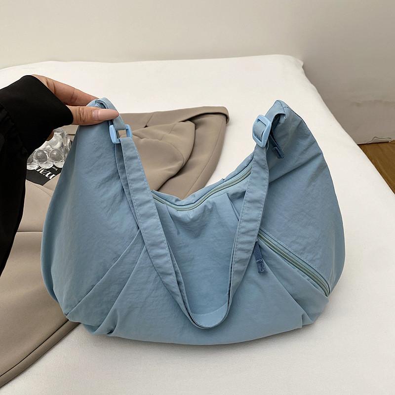 Bolso cruzado de nailon estilo callejero con cierre de cremallera para uso diario