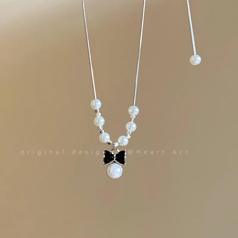 Настоящая любовь безупречна  Кулон-бант Жемчужное ожерелье Женское Новое Высококлассное Легкая роскошь Ключичная цепочка