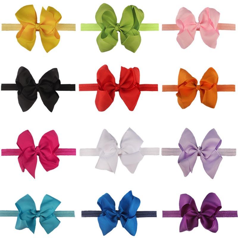 

New children s headband, fashionable baby hair accessories, dovetail bow headband, solid color seamless elastic belt.