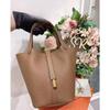 Equipaje Guangzhou bolso de mujer 2025 bolso nuevo otoño e invierno patrón de lichi bolso cubo bolso de mujer bolso de mano bolso cesta de verduras