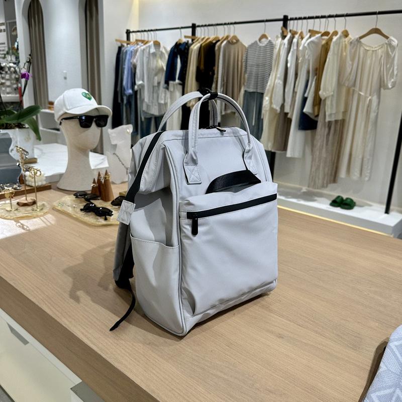 Značka módního návrháře Dámský a pánský batoh Trendy styl Taška na notebook 15,6 palce PU kůže Businessový ruksak Dámská školní taška