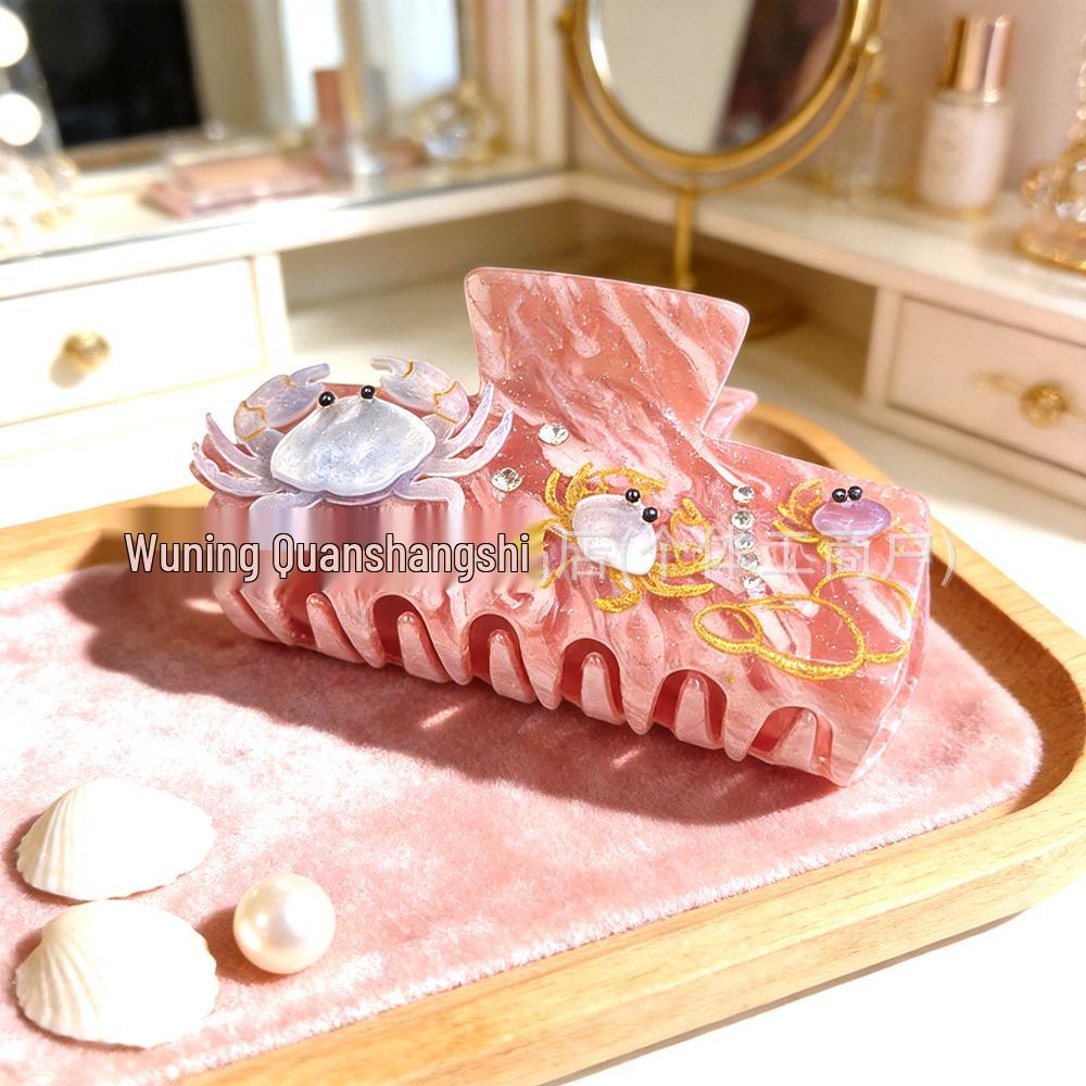 Elegancka spinka do włosów z cyrkoniami w kształcie rozgwiazdy i muszelkowa klamra do upięć