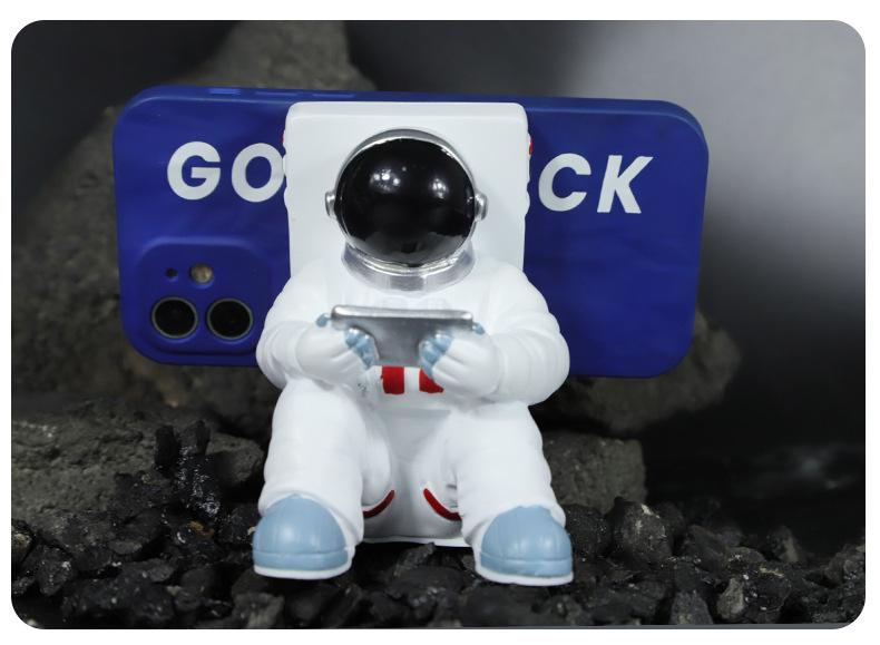 Cartoon Astronaut Telefoonhouder: Creatief Hars Ornament & Tabletstandaard voor Bureau