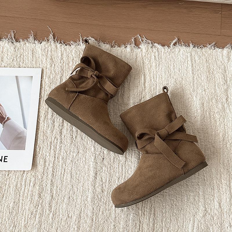 Fashion retro style bow short boots women's autumn and winter design sense lace-up single boots with skirt solid color Martin boots