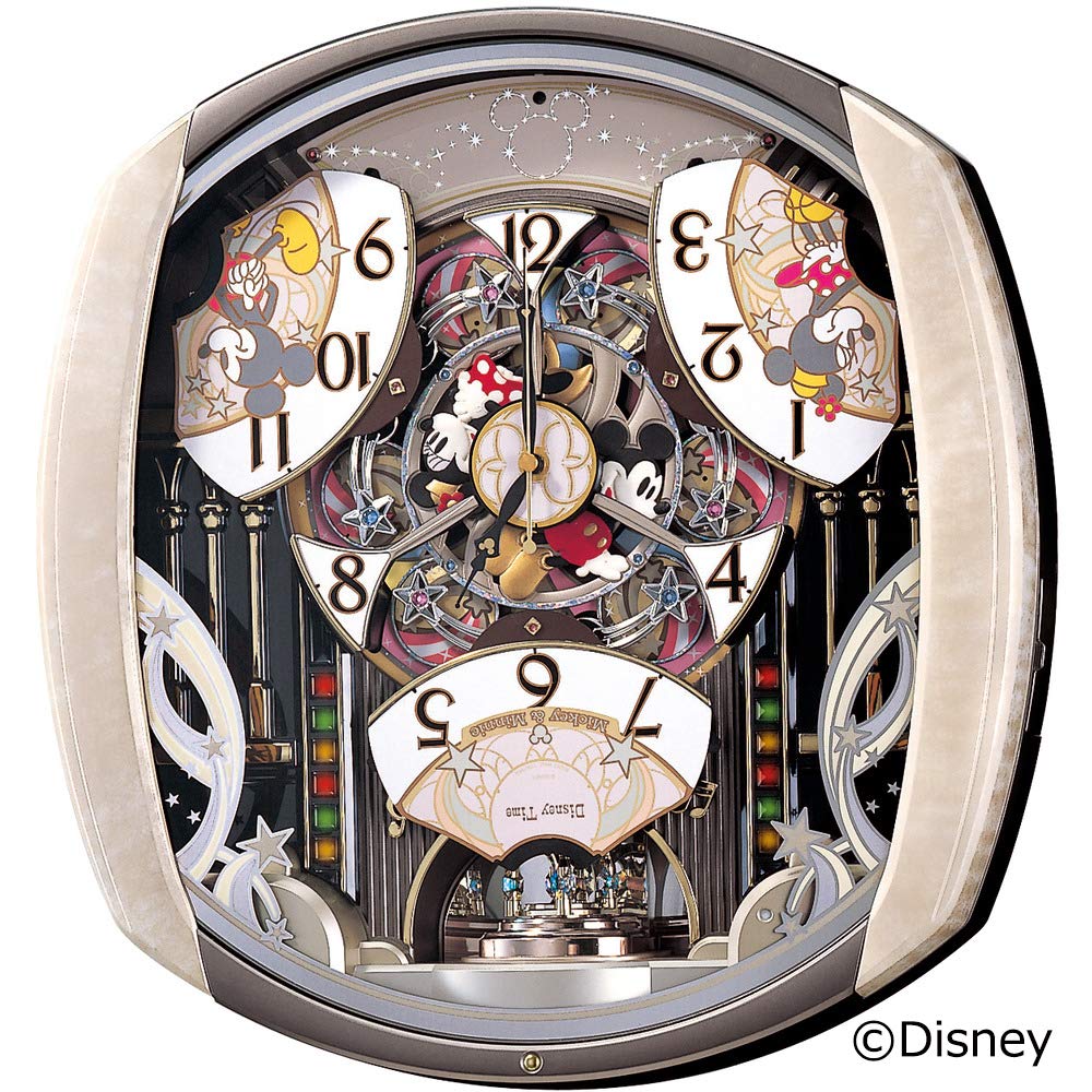 Seiko Clock a mechanical clock featuring Disney characters Mickey Mouse and Minnie featuring 6 a rotating and a pale pink marbled FW563A,