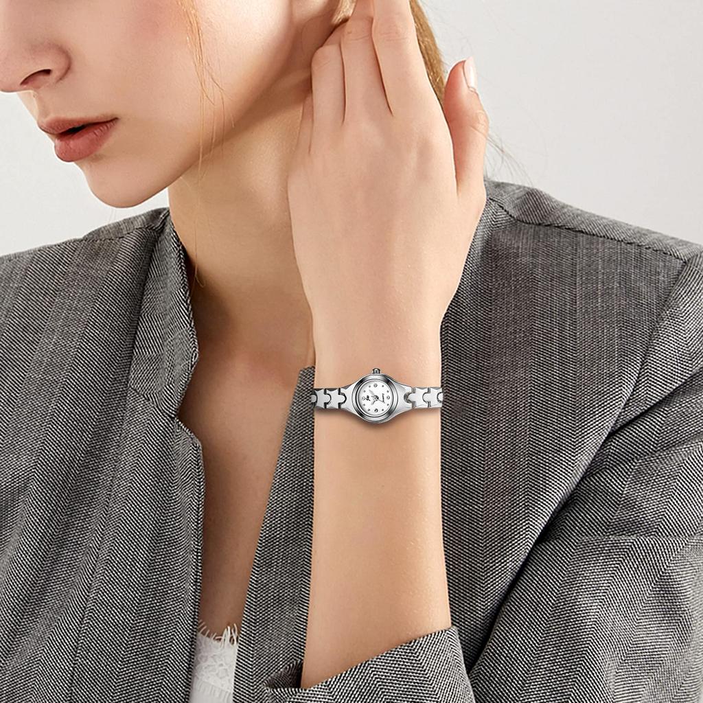 Popular, stylish, and cute women's bangle watch bracelet with analog display, small dial, waterproof quartz movement, and silver finish. A great gift