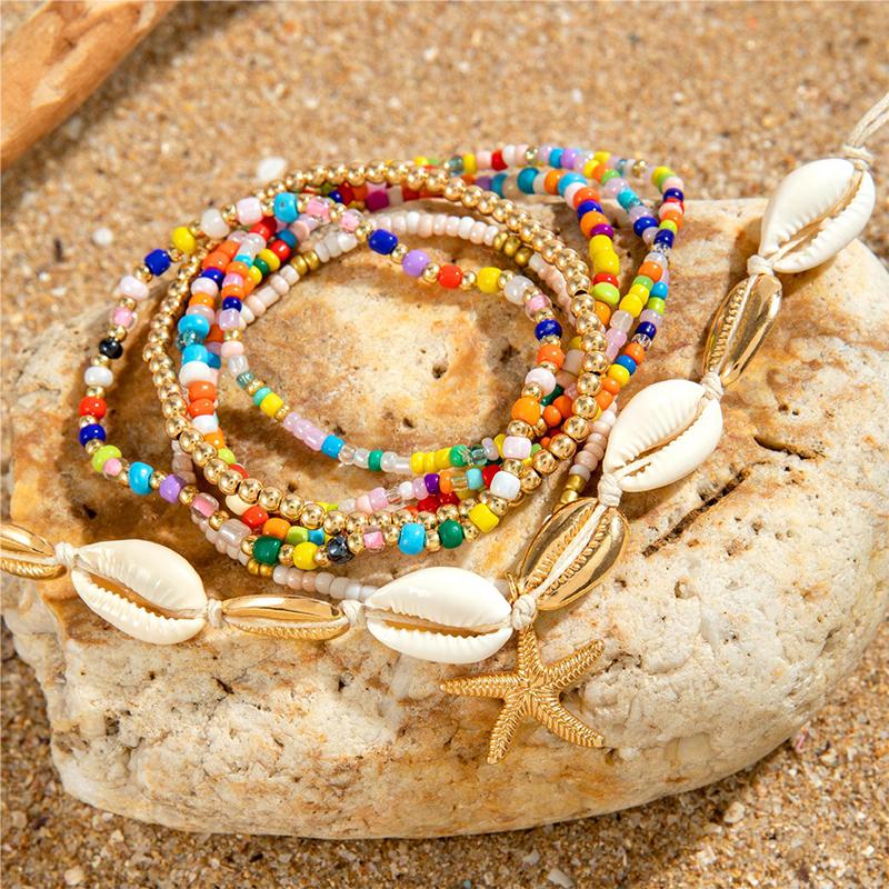 Set da 7 Pezzi Stile Bohémien Resort Braccialetto Intrecciato con Perline di Conchiglie Set di Braccialetti con Perle di Riso Stella Marina Stile Spiaggia Per Donna