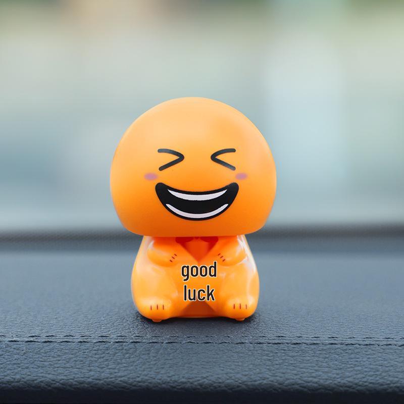 Solar-Powered Smiley Face Dashboard Ornament: A Fun, Cute Decompression Figurine for Car Décor.